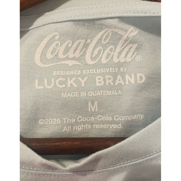 Lucky Brand x Coca-Cola Tee M Blue USA Flag Logo NWT Collab Graphic Shirt - Picture 8 of 9